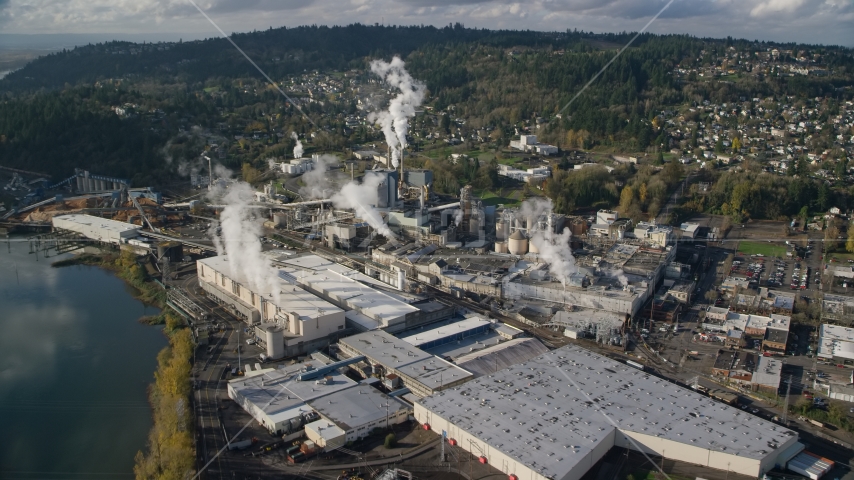 Steam rising from the Georgia Pacific Paper Mill in Camas, Washington Aerial Stock Photo AX154_213.0000037F | Axiom Images