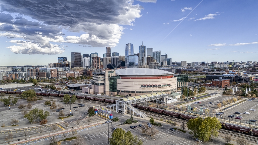 The Pepsi Center arena with the city skyline in the background, Downtown Denver, Colorado Aerial Stock Photo DXP001_056_0002 | Axiom Images